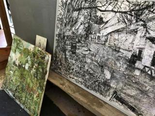 same painting flat next to drawing